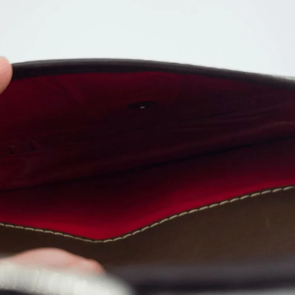 Dooney and Bourke Black/Brown Leather Wristlet